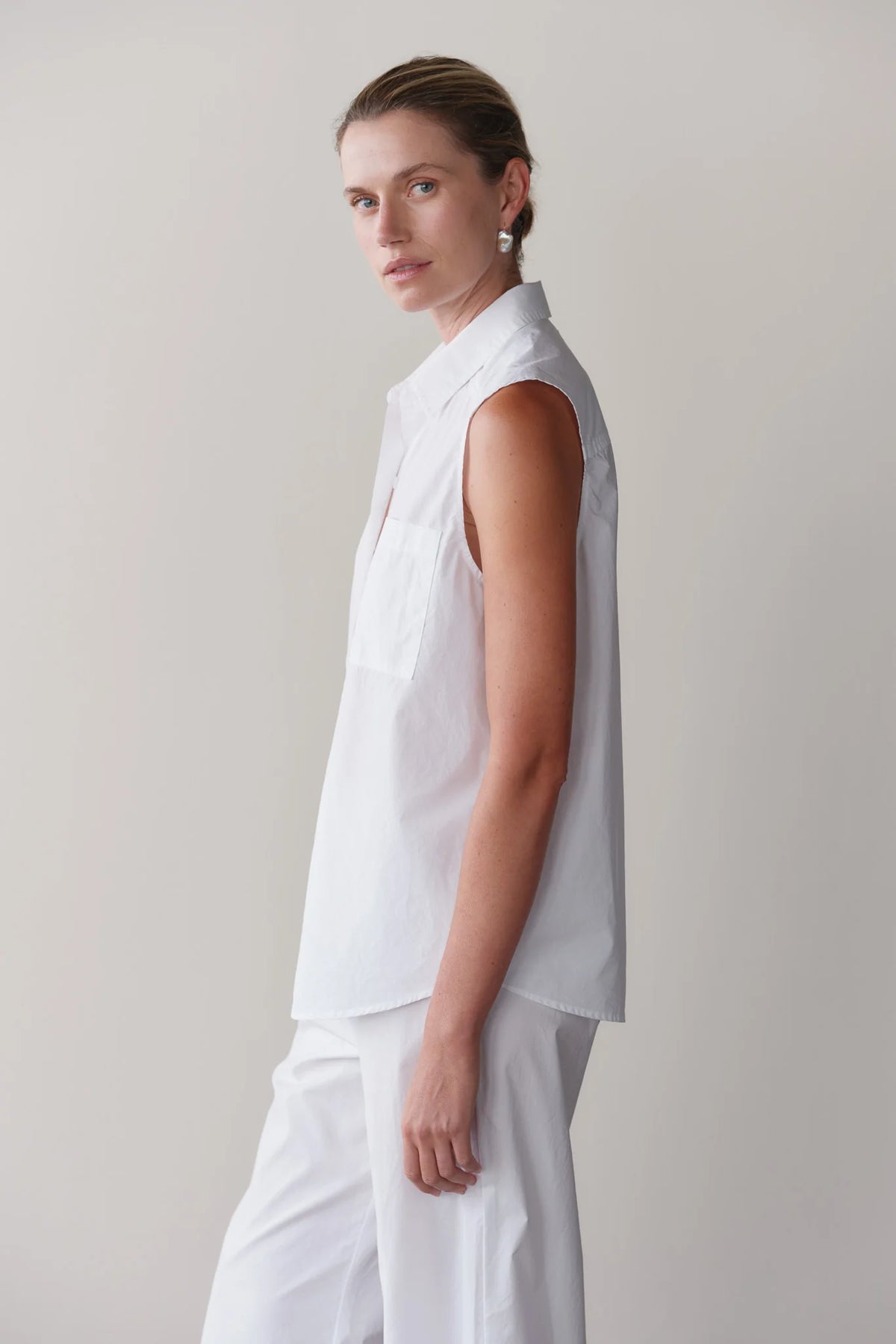 DONNI. | The Pop Sleeveless Shirt in Powder