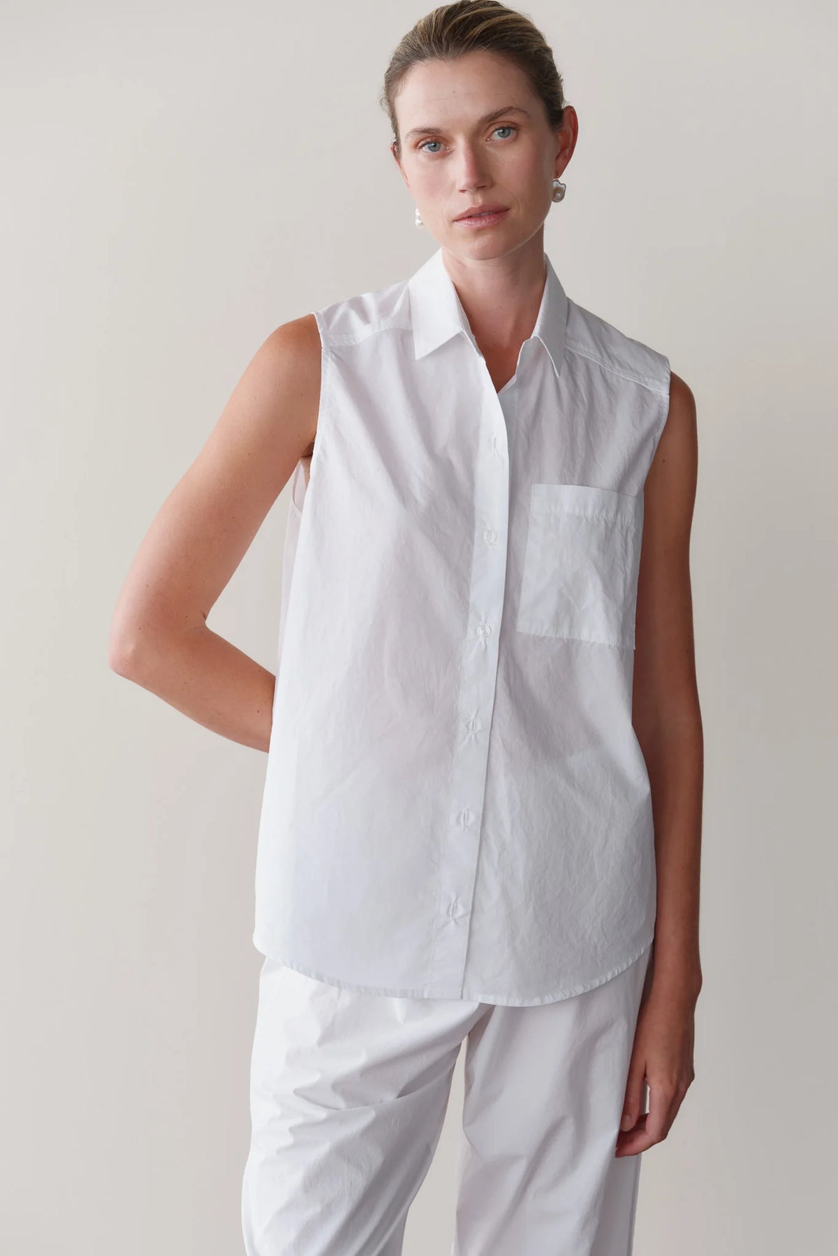 DONNI. | The Pop Sleeveless Shirt in Powder